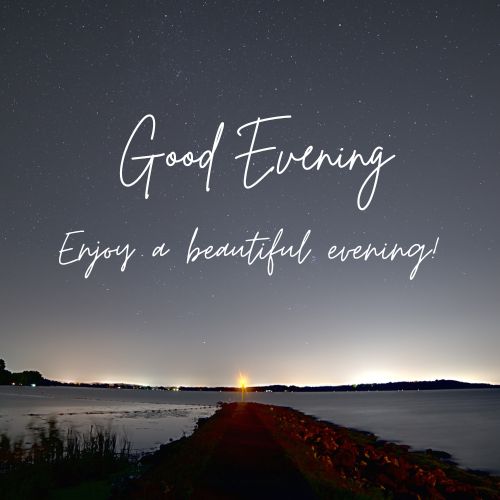  A night sky filled with stars over a calm lake. The text "Good Evening" and "Enjoy a beautiful evening!" is superimposed on the image in a white, cursive font. A distant light can be seen on the horizon.