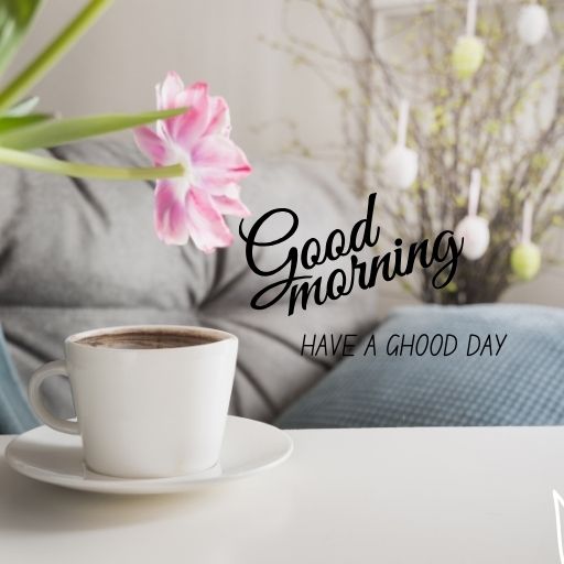 A white frame with the words "Good Morning!" in cursive script is surrounded by pink and purple tulips on a light blue background.