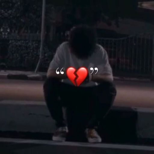 a person sitting on a curb with a broken heart