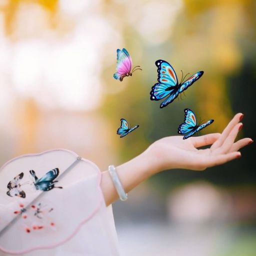 A person's hand releasing vibrant blue butterflies, with one butterfly still on her open palm