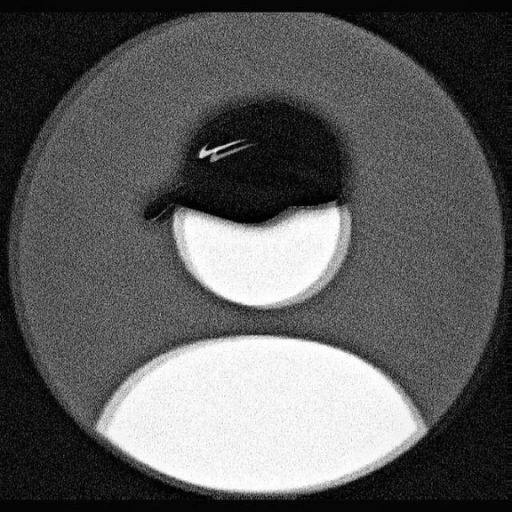 a black and white photo of a hat on a circular object