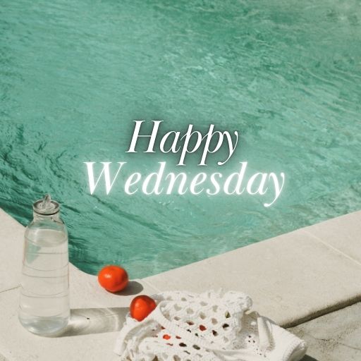 a bottle of water sitting next to a pool