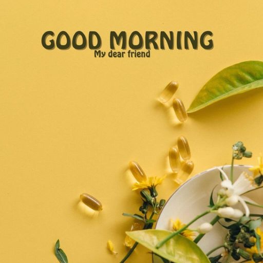 a bowl of flowers on a yellow background with the words good morning