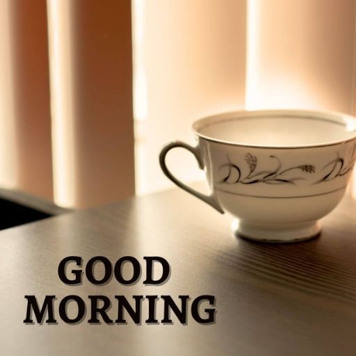 a coffee cup sitting on top of a wooden table