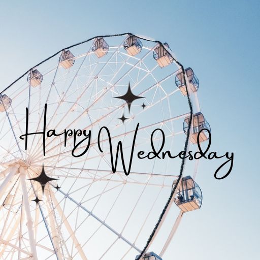 a ferris wheel with the words happy wednesday written on it