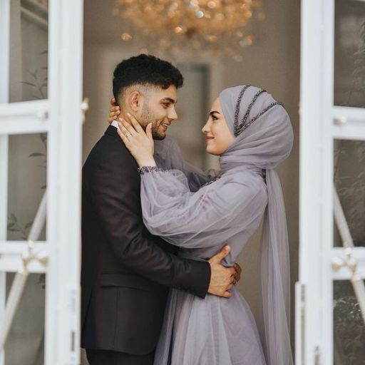 a man and a woman standing next to each other