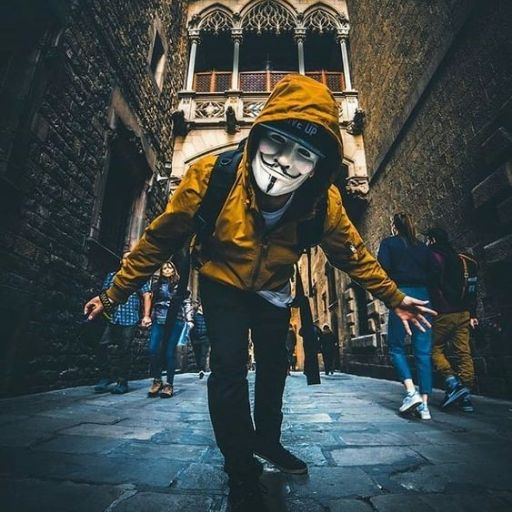 a person wearing a mask walking down a street