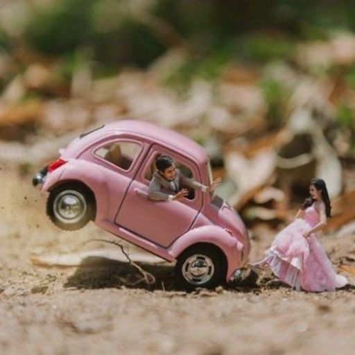 a toy car with a bride and groom in it