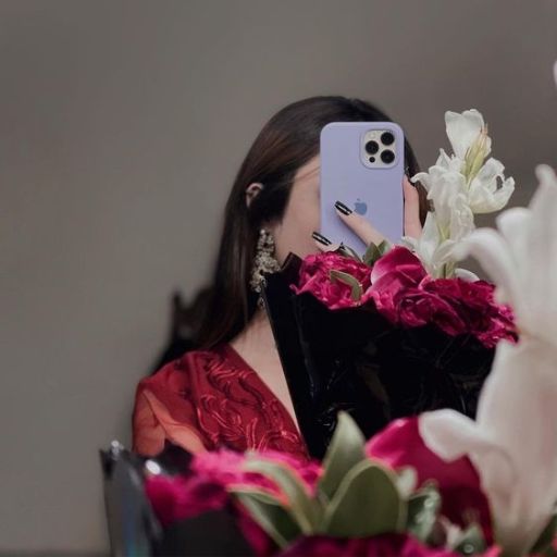 a woman taking a picture of herself with her phone (2)