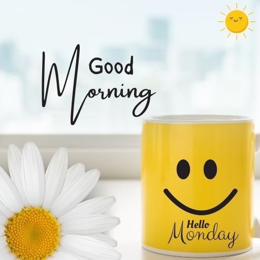 a yellow coffee mug sitting next to a white daisy