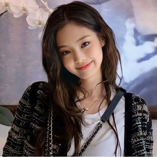 a young asian woman is smiling for the camera