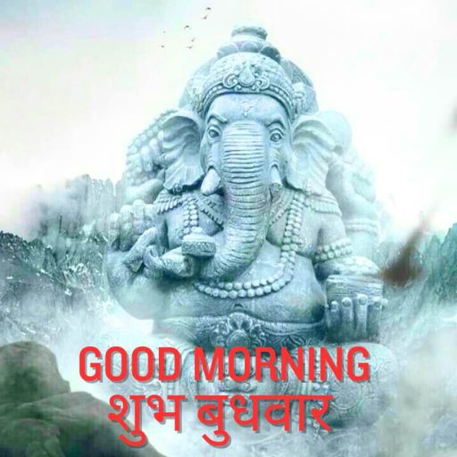 an elephant statue with the words good morning in the background