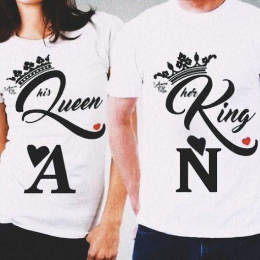 A couple proudly wearing matching t-shirts that read _Queen_ and _King,_ showcasing their love and unity