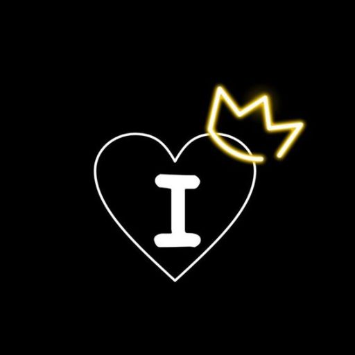 A neon sign with a heart symbol, the letter _I_ inside, and a crown on top against a black background