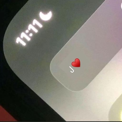 Digital display showing 11_11 with a small red heart symbol