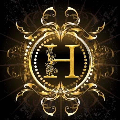 Ornate golden letter 'H' with intricate designs on a black background