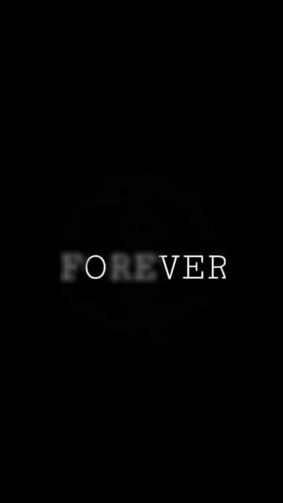 The word FOREVER in white fading text centered on a black background.