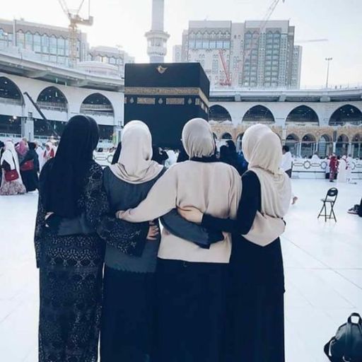 a group of women standing next to each other (2)