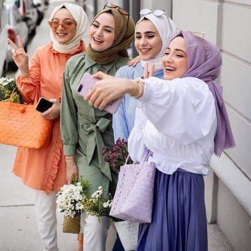 a group of women standing next to each other (3)