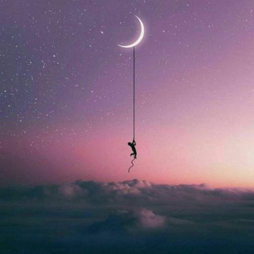 a man hanging from a rope with a crescent moon in the background