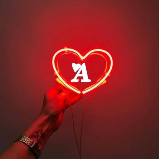 a person holding a neon sign with the letter a in the shape of a heart