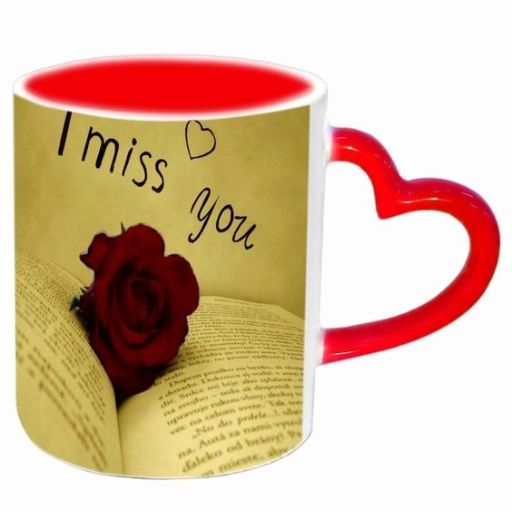 a red and white coffee mug with a rose on it