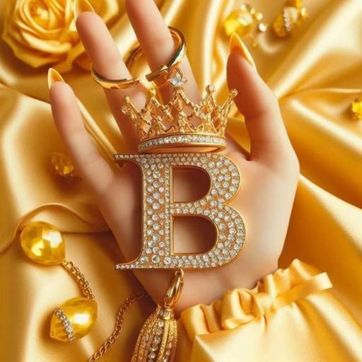 a woman's hand with a ring and a letter b on it