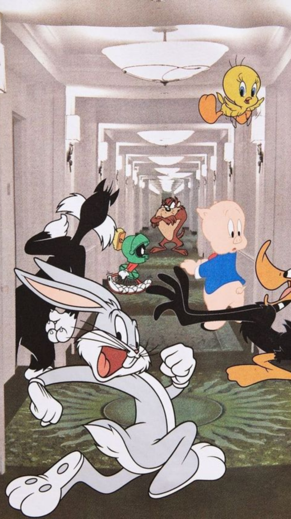 Animated characters running down a corridor, with Bugs Bunny in the lead