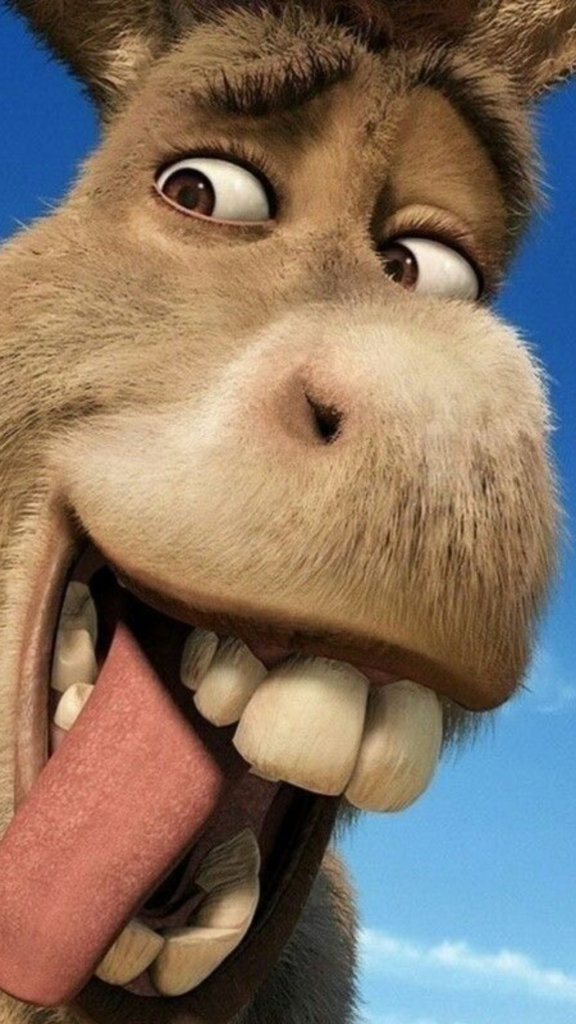 Close-up of a cartoon donkey with a goofy expression, sticking out its tongue