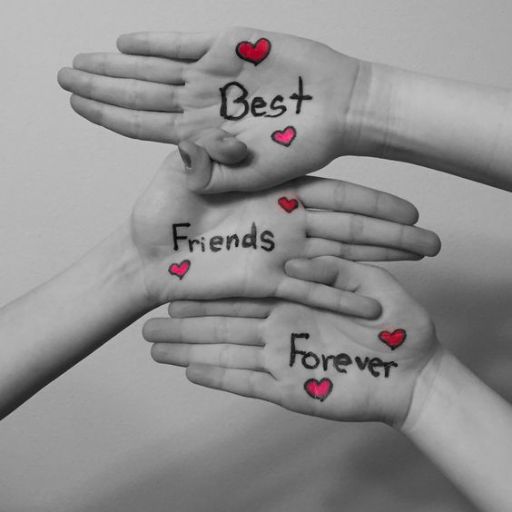 Four hands stacked with _Best Friends Forever_ written on them, adorned with small red hearts