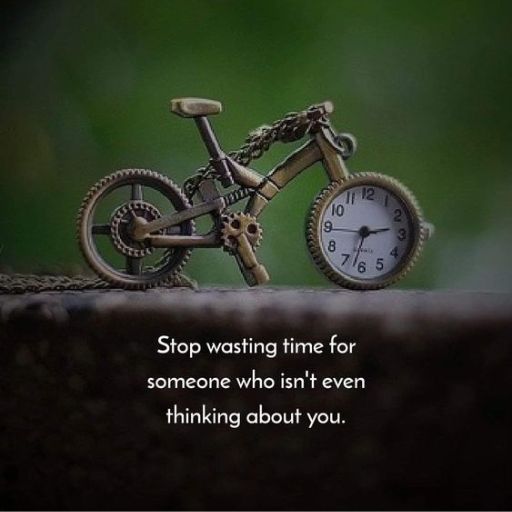 Miniature bicycle with clock wheels on ledge, text overlay reads motivational quote about time