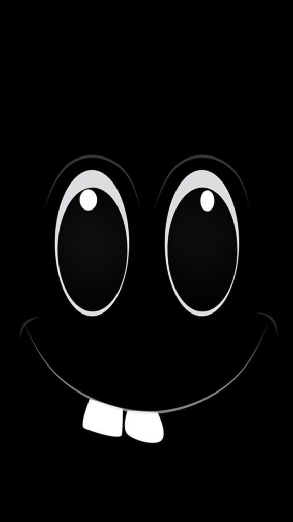 Stylized black and white cartoon face with large eyes and a smiling mouth on a black background