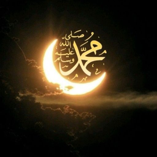 A crescent moon with Arabic calligraphy against a night sky