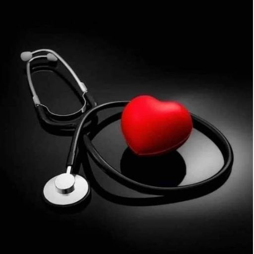 A stethoscope and a red heart on a black background, symbolizing healthcare or cardiology